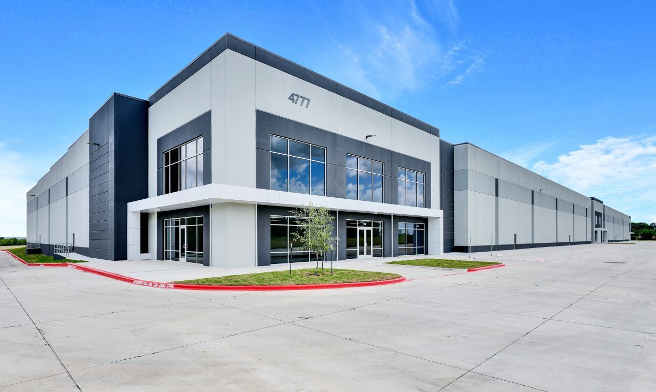 A photo of a concrete industrial building.