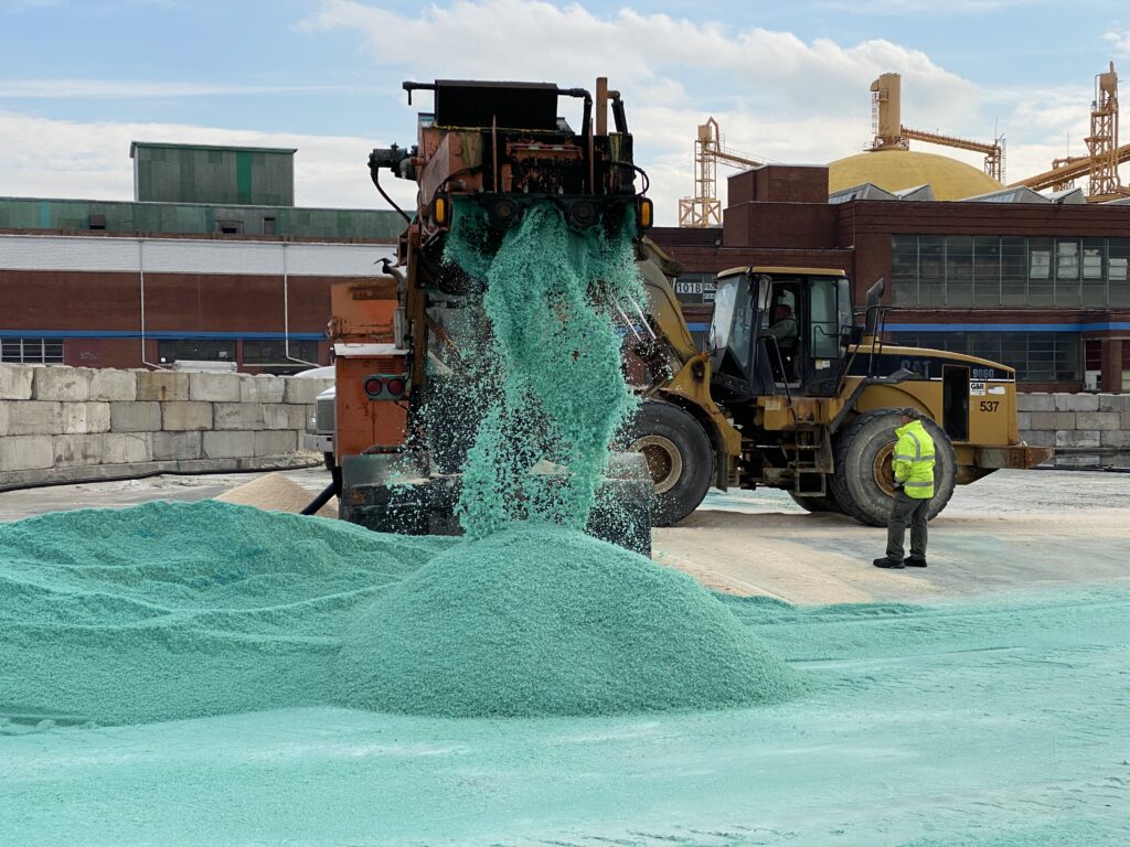 A picture of road salt being treated at a Silvi Materials' facility. 